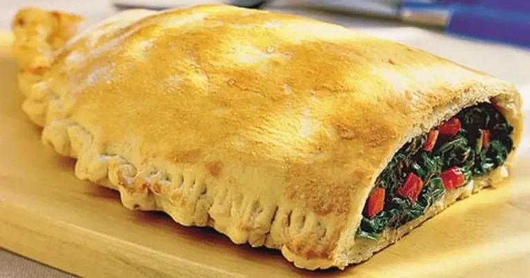 Foto da receita de Calzone de tomate e rúcula