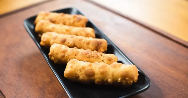 Foto da receita de Enroladinho de queijo com doce de leite