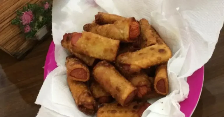 Foto da receita de Enroladinho de salsicha com massa de pastel