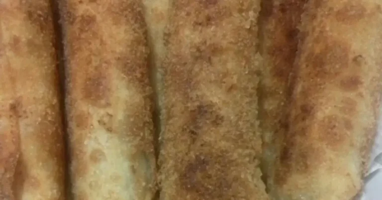 Foto da receita de Enroladinho de salsicha com massa de pastel empanado