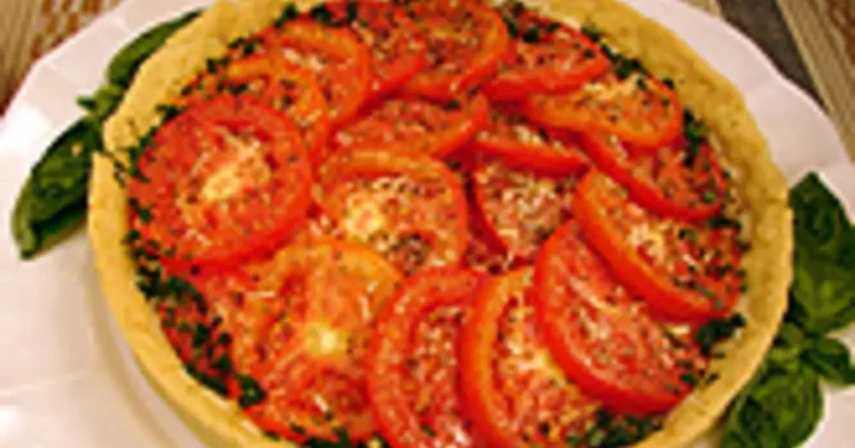 Foto da receita de Torta de tomates e queijo minas