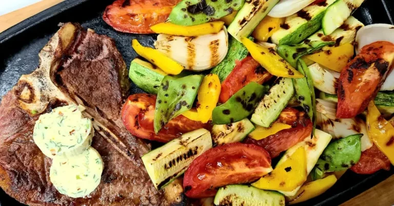 Foto da receita de T-bone com manteiga de alho e vegetais