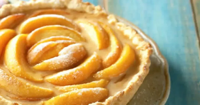 Foto da receita de Torta de doce de leite e pêssego