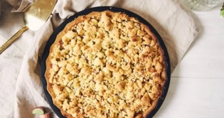 Foto da receita de Torta de pernil com massa de farofa