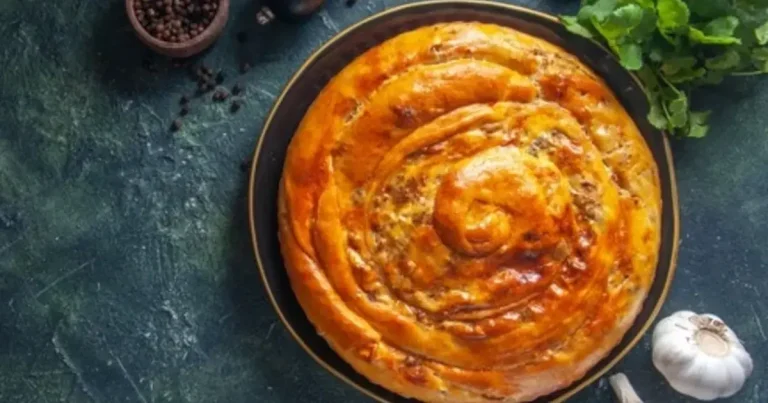 Foto da receita de Torta de Rúcula e Tomate Seco