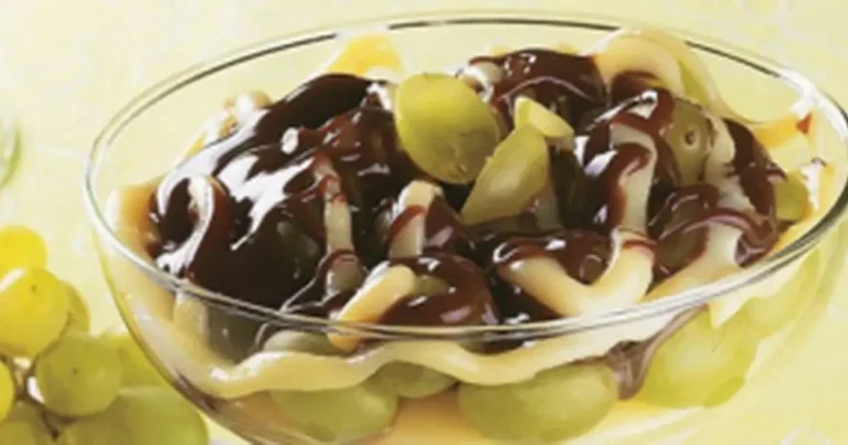 Foto da receita de Torta de uva com brigadeiro