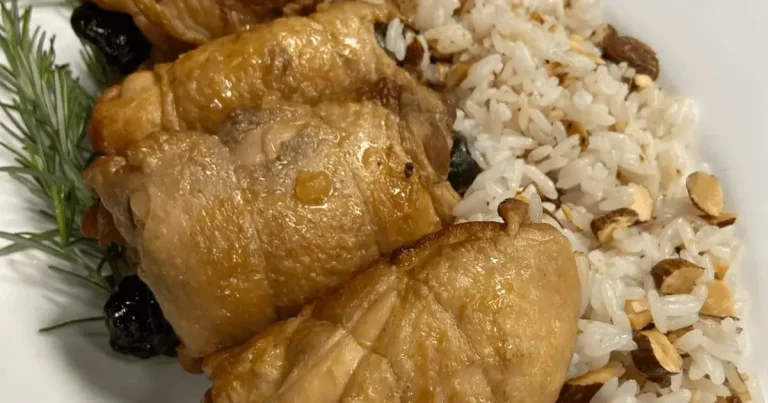 Foto da receita de Sobrecoxa recheada ao molho de laranja e arroz com espumante
