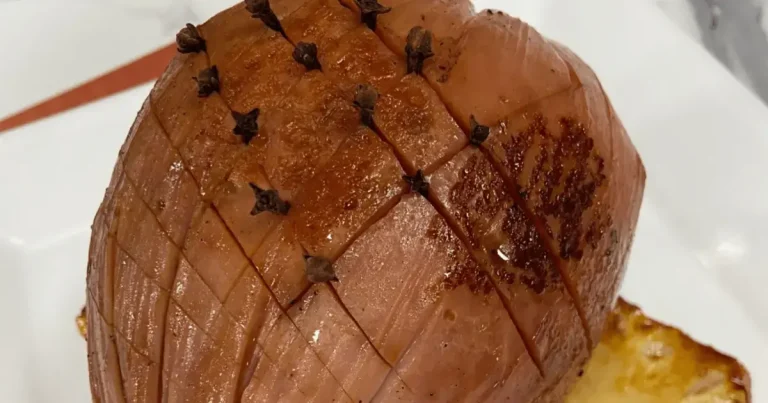 Foto da receita de Tender ao molho de laranja com abacaxi grelhado