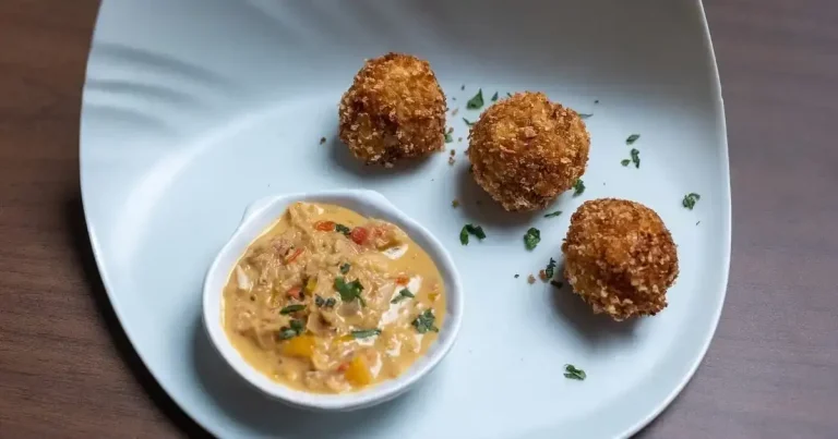 Foto da receita de Arancini de siri com molho de moqueca