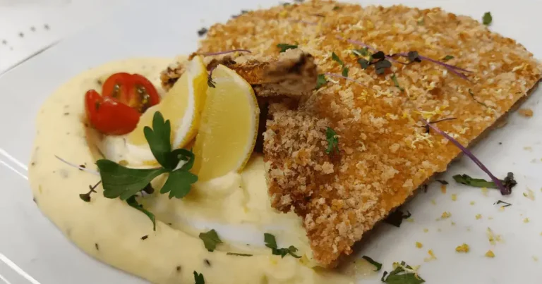 Foto da receita de Chuleta à milanesa com purê de batata e ervas-finas