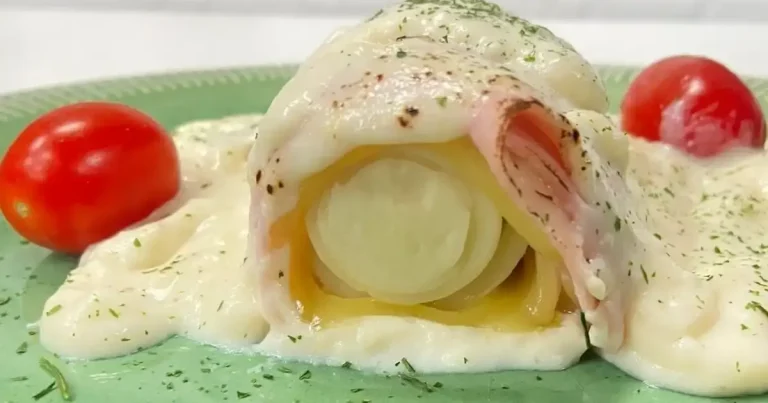 Foto da receita de Enroladinho de palmito ao molho bechamel