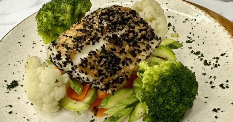 Foto da receita de Peixe branco com crosta de gergelim e legumes na manteiga